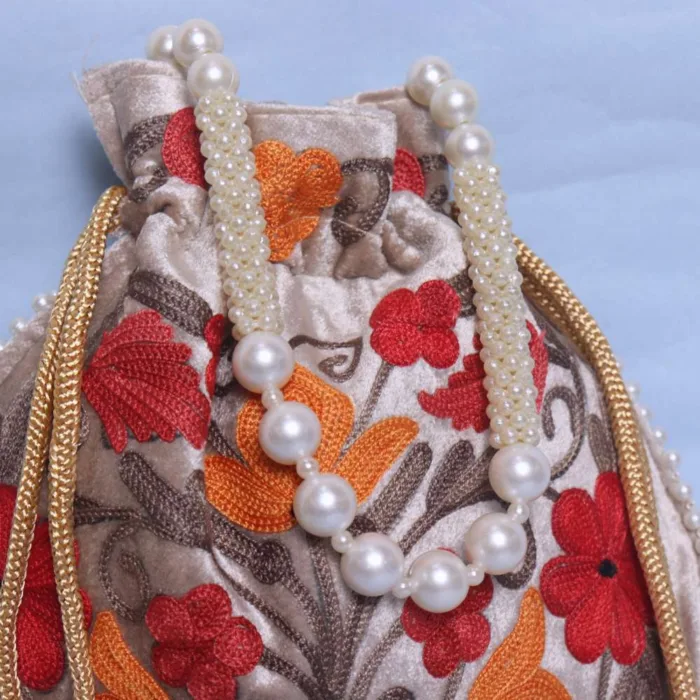 Stylish Cream Velvet Potli Bag with Detailed Aari Work - Image 2