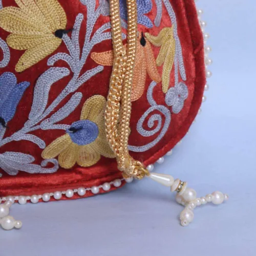 Velvet potli bag with aari embroidery15