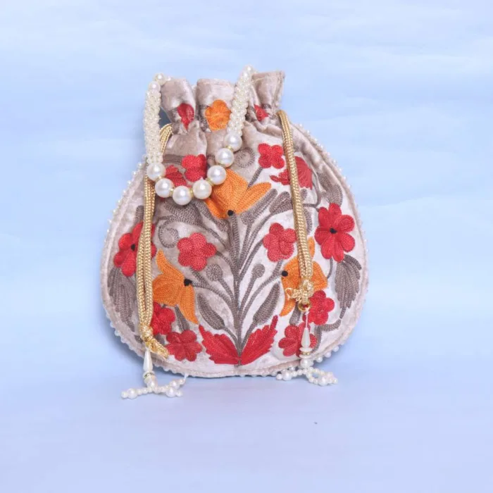 Cream Velvet Aari Embroidered Potli Bag for Festive Occasions