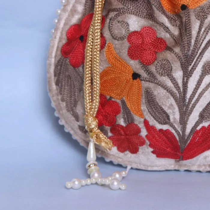 Cream Velvet Aari Embroidered Potli Bag for Festive Occasions - Image 3