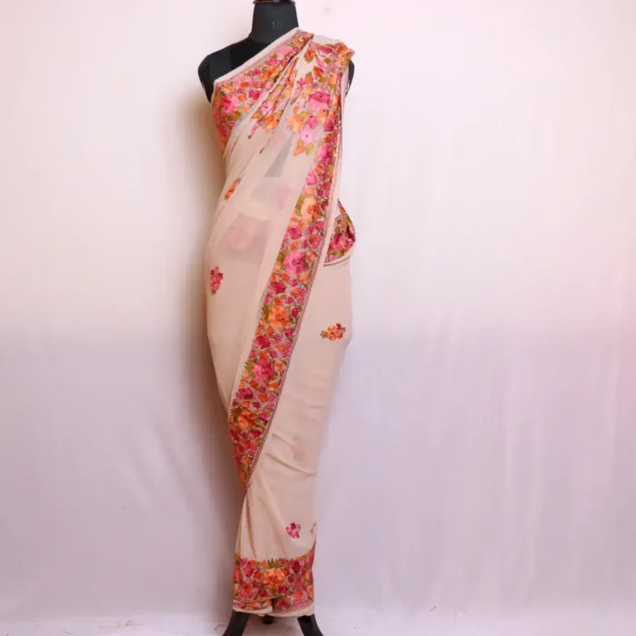 Elegant Creamy Georgette Heavy Aari Saree - Zikr Collection